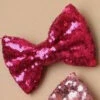Ladies 1980s Bright Pink Sequin Bow Hair Clip -PartyPersona Store 6674 bright pink